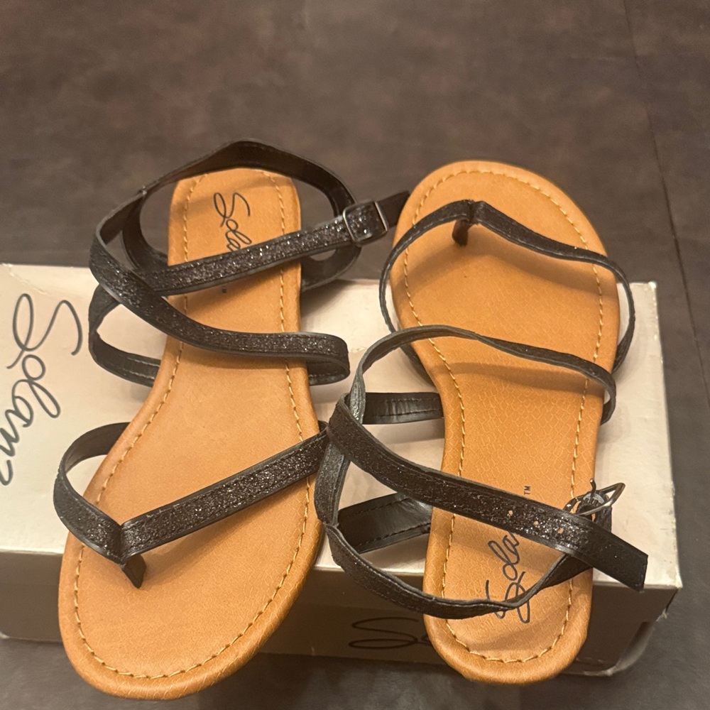 Sleek Black Strappy Sandals by Solem
